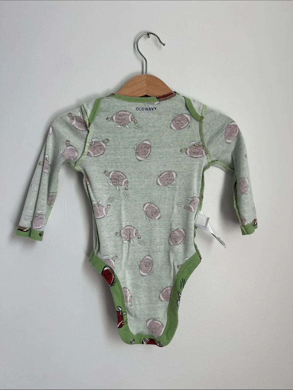 Old Navy | Green Football-Print Long-Sleeve Baby One-Piece 6-12 Months